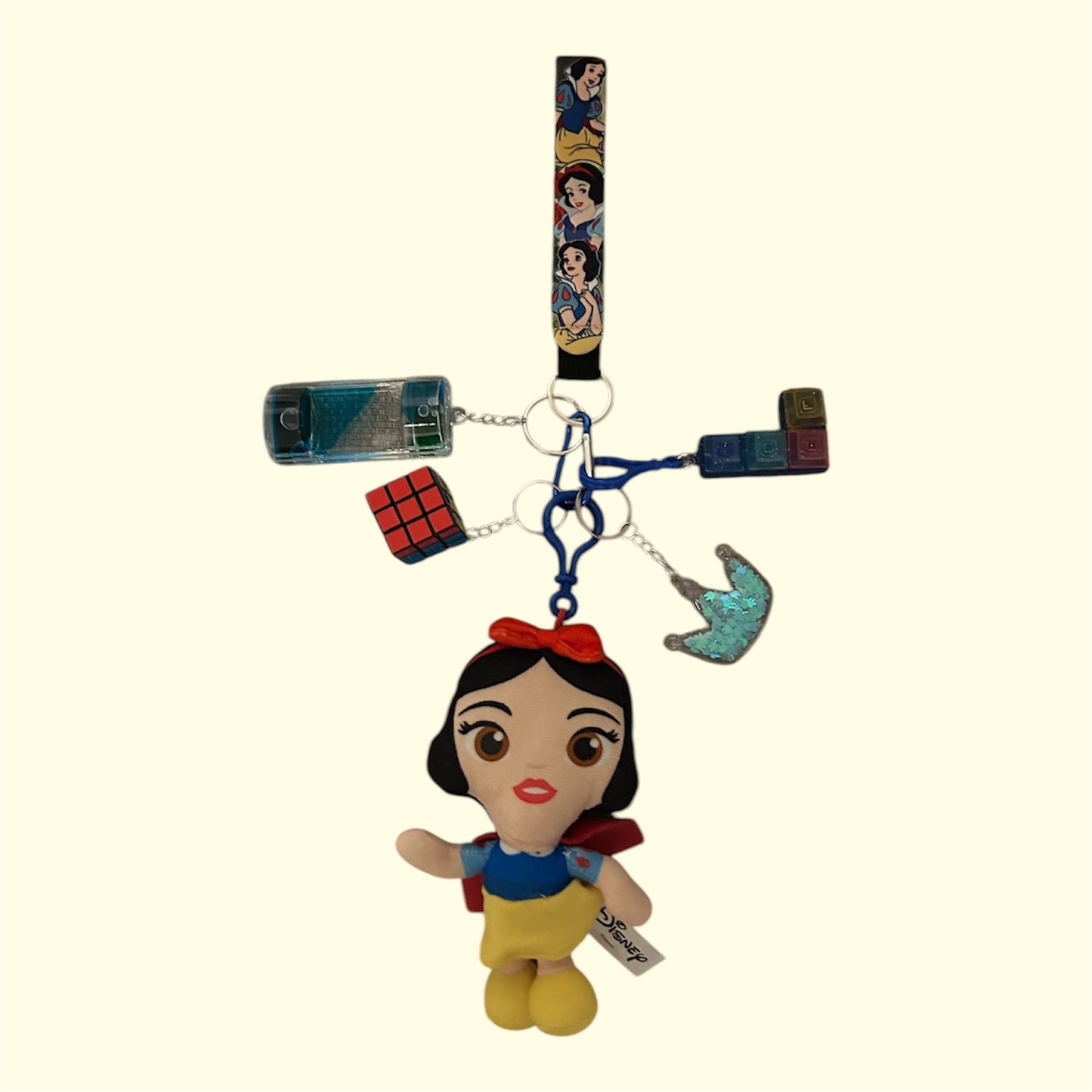 Snow White fidgets with key strap