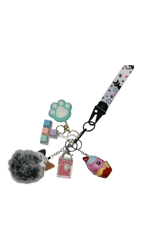 Cat fidgets with key strap